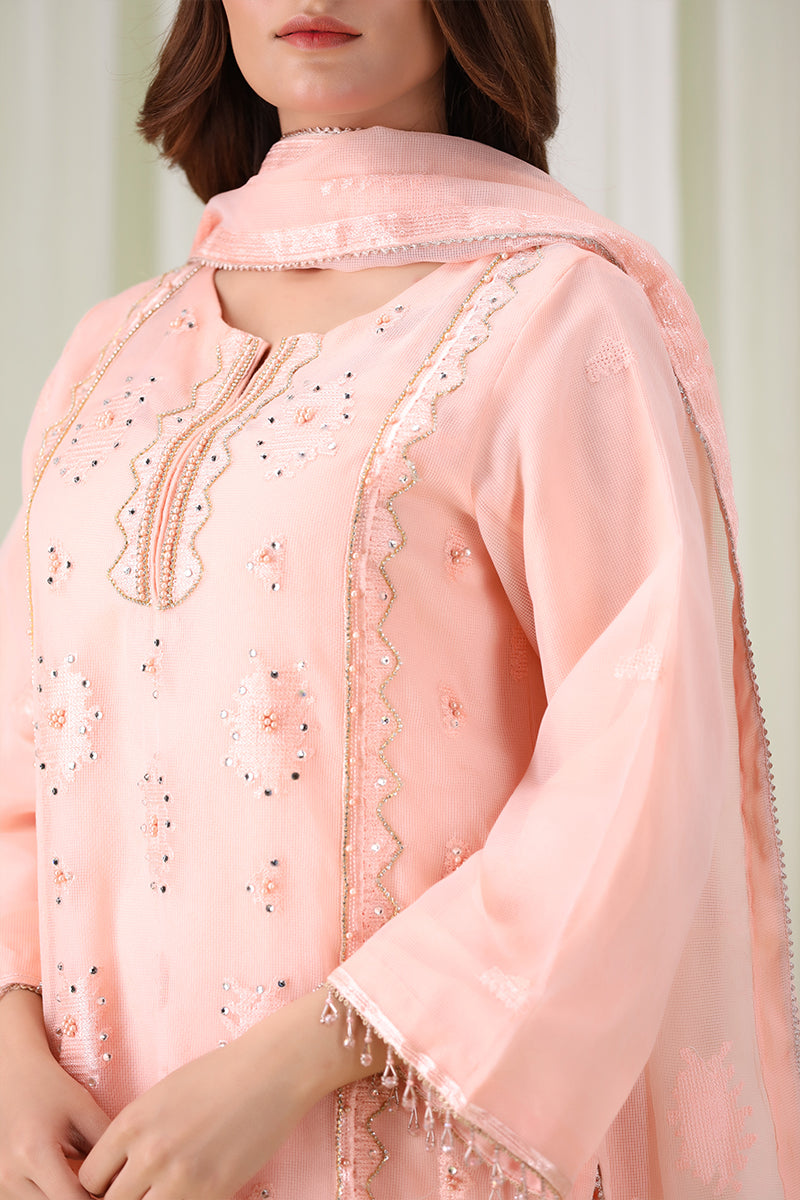 Sanawa Clothing’s peach embroidered shalwar kameez with matching dupatta, showcasing refined craftsmanship and timeless elegance.