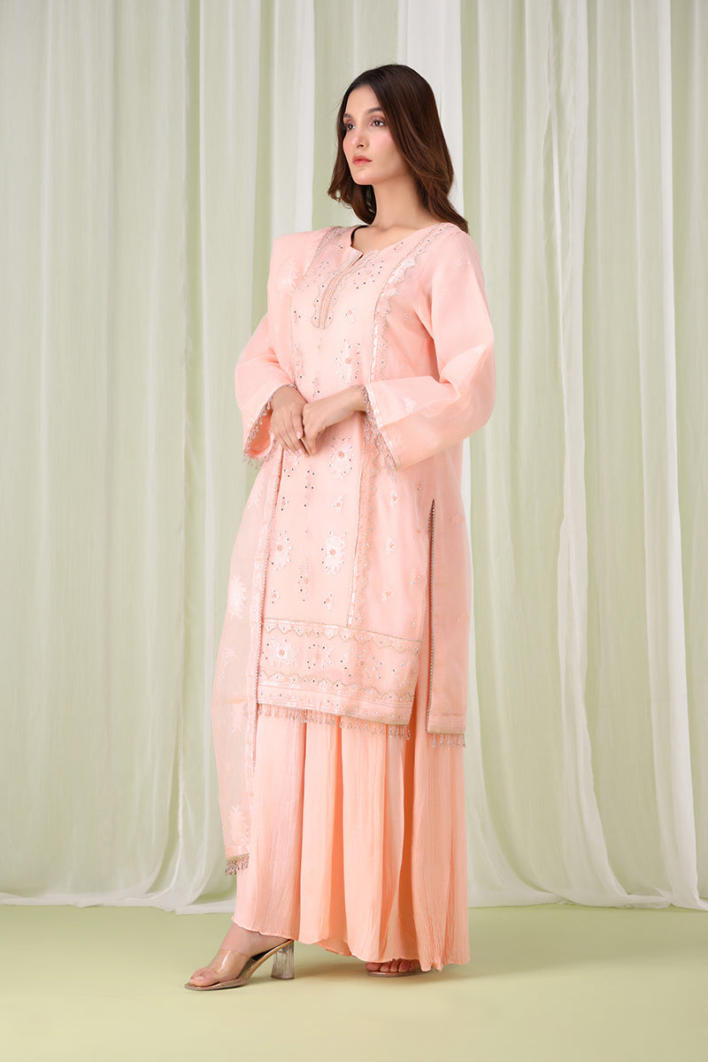Sanawa Clothing’s peach embroidered shalwar kameez with matching dupatta, showcasing refined craftsmanship and timeless elegance.